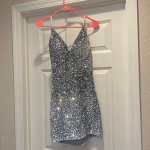 I am selling a brand new prom dress never worn before!